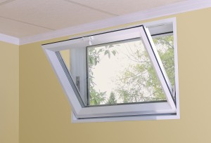 Basement hopper window