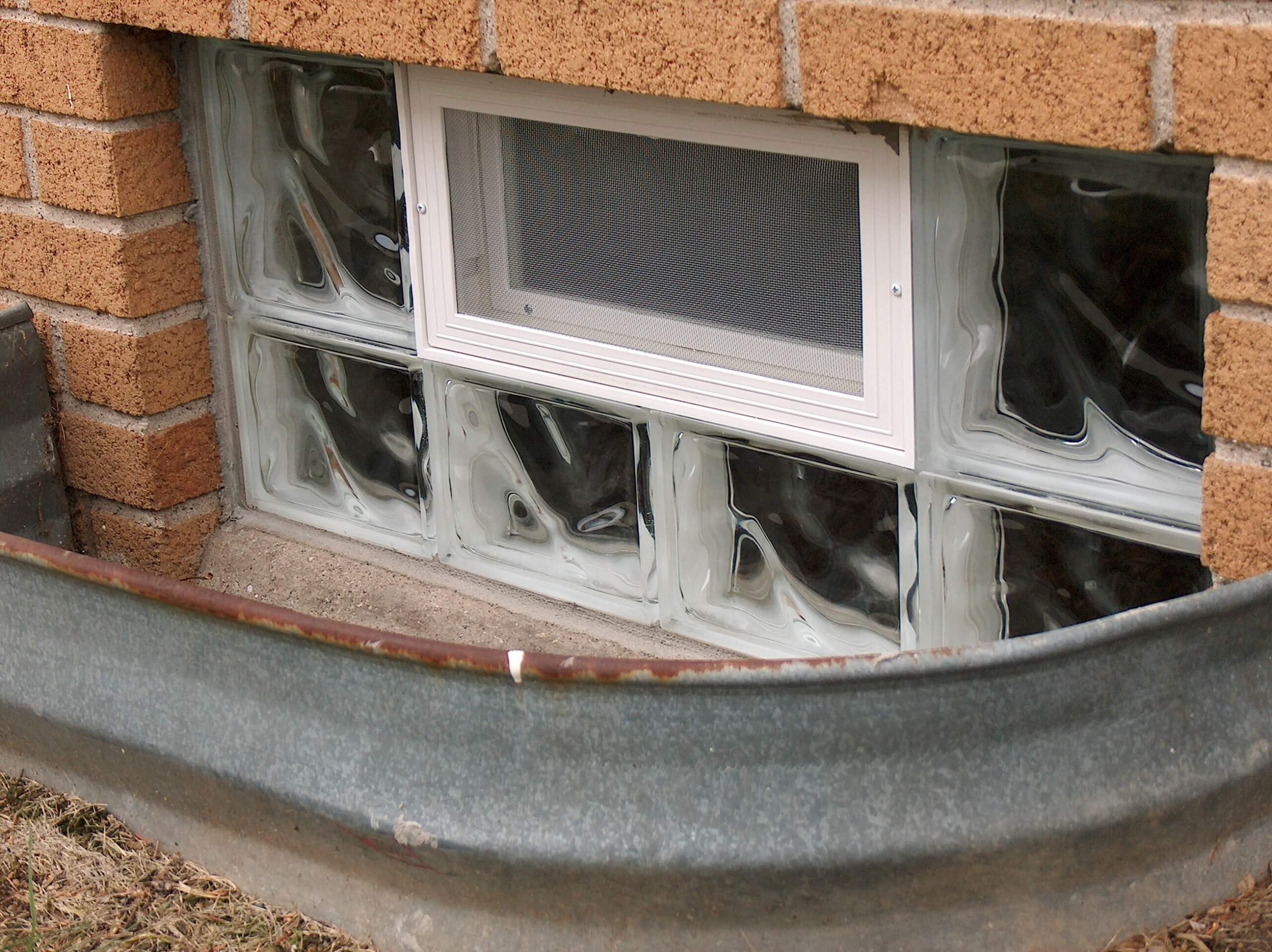 Glass block basement window shallow well